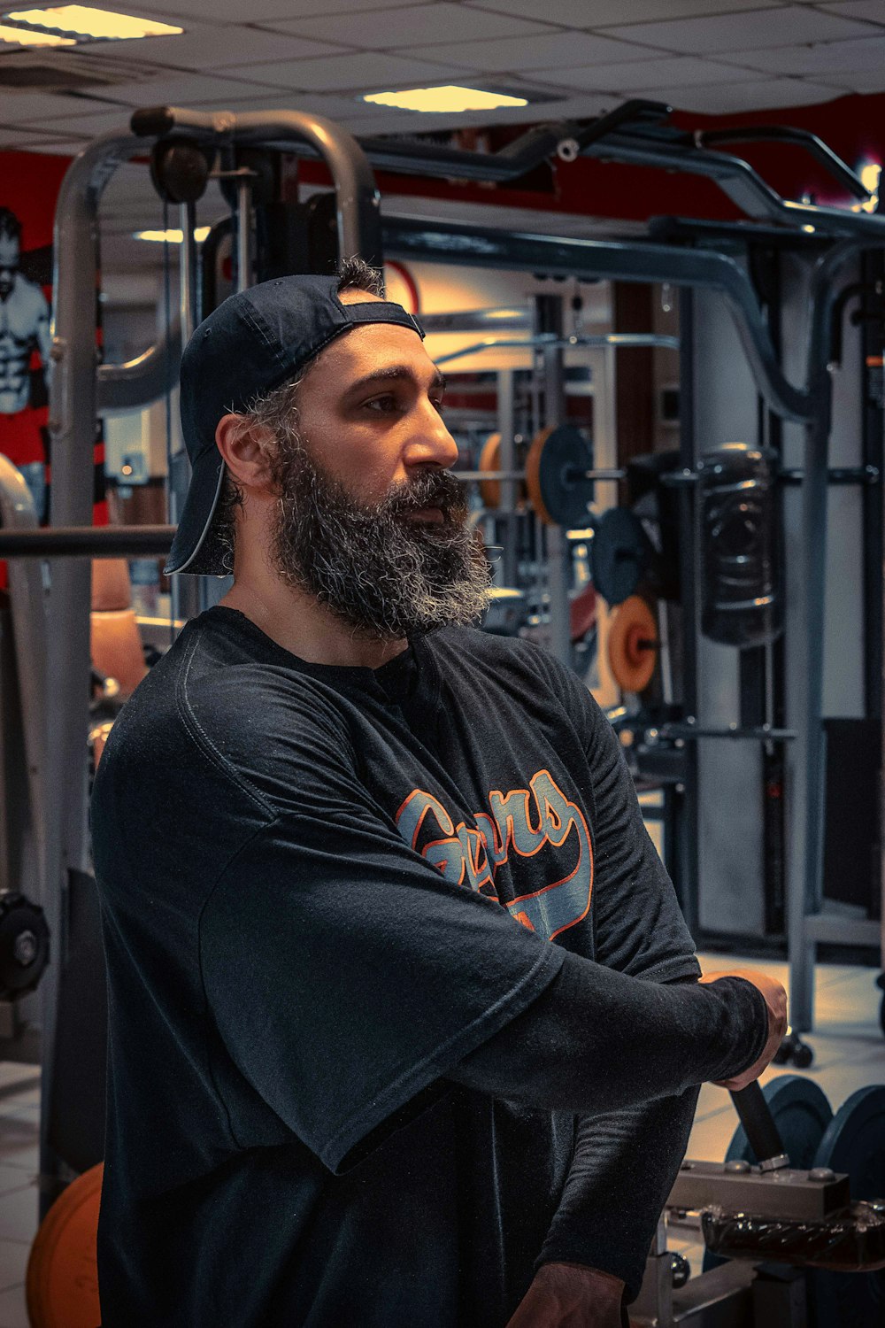 Karim Haddad sitting between the machines