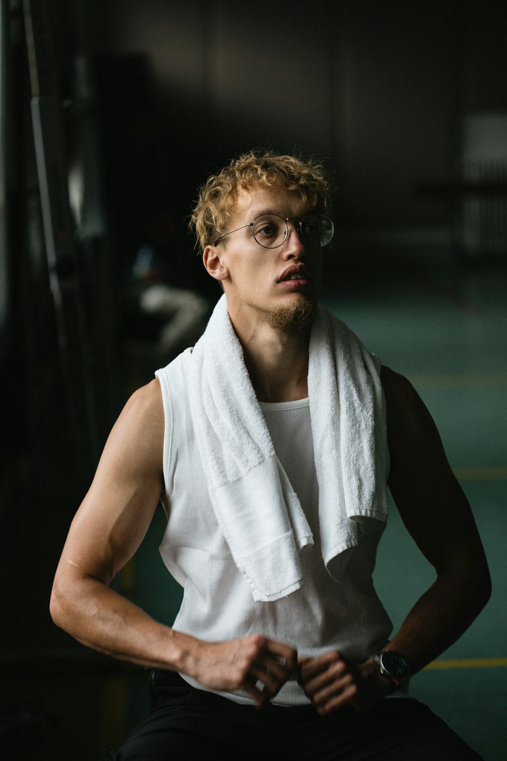 Tom Keller with a towel around his neck after a session